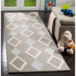 Safavieh Kids SFK902 Hand Tufted Area Rug - Safavieh